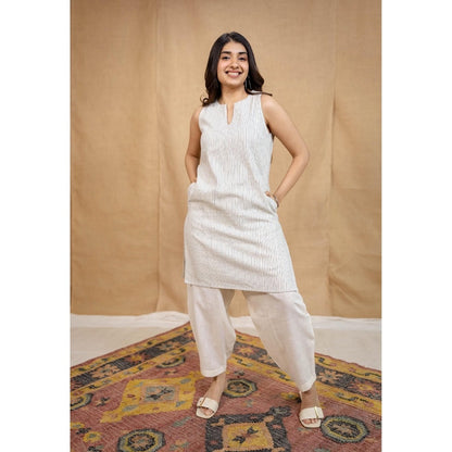 The Indian Ethnic Co. Off-White Solid Cotton Afghan Palazzo