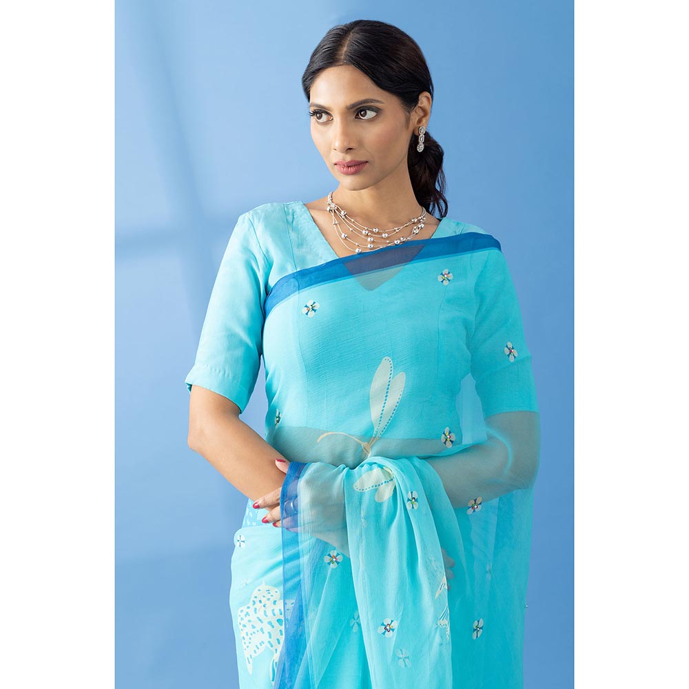Thee Modern Roots Light Blue Printed and Embellished Chiffon Saree with Unstitched Blouse