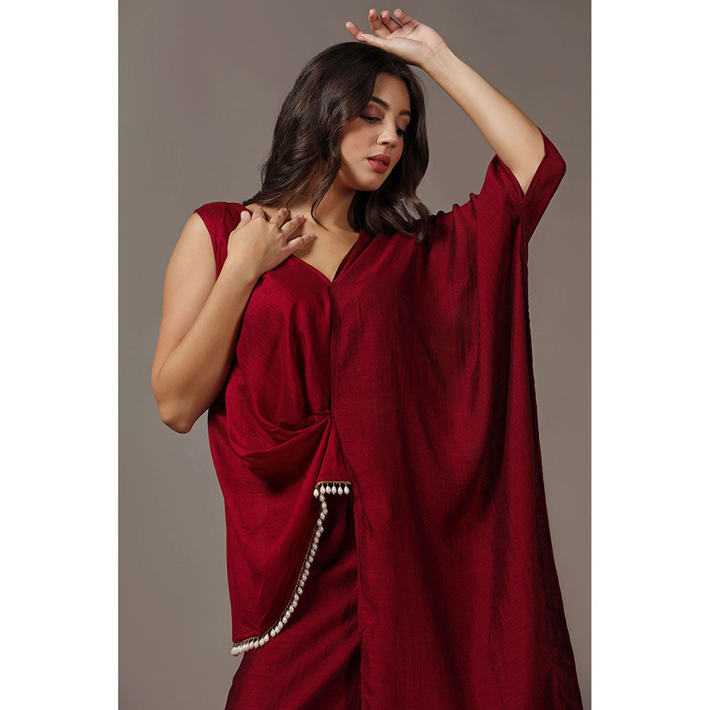 "Two Sisters" by Gyans Maroon Asymmetrical Top with Flared Pants (Set of 2)