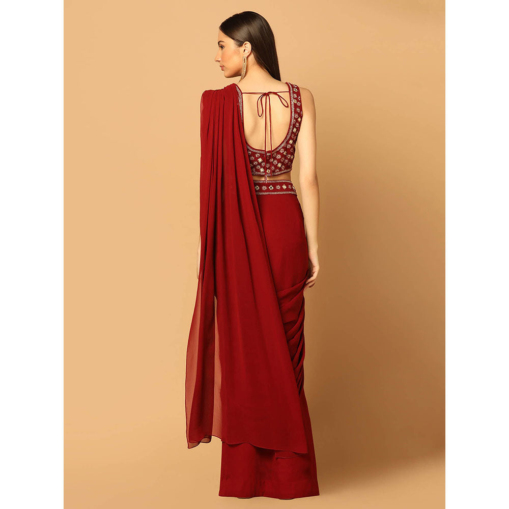 "Two Sisters" by Gyans Maroon Draped Saree with Stitched Blouse and Cape