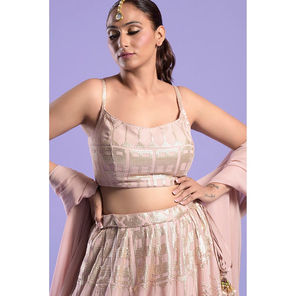 "Two Sisters" by Gyans Nude Pink Ombre Organza Lehenga Set