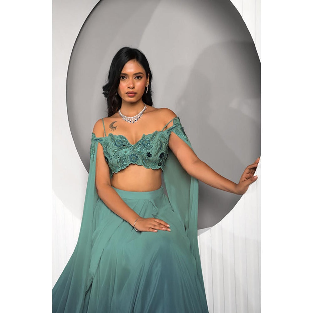 "Two Sisters" by Gyans Teal Georgette Embroidered Sleeveless Lehenga with Cape Blouse
