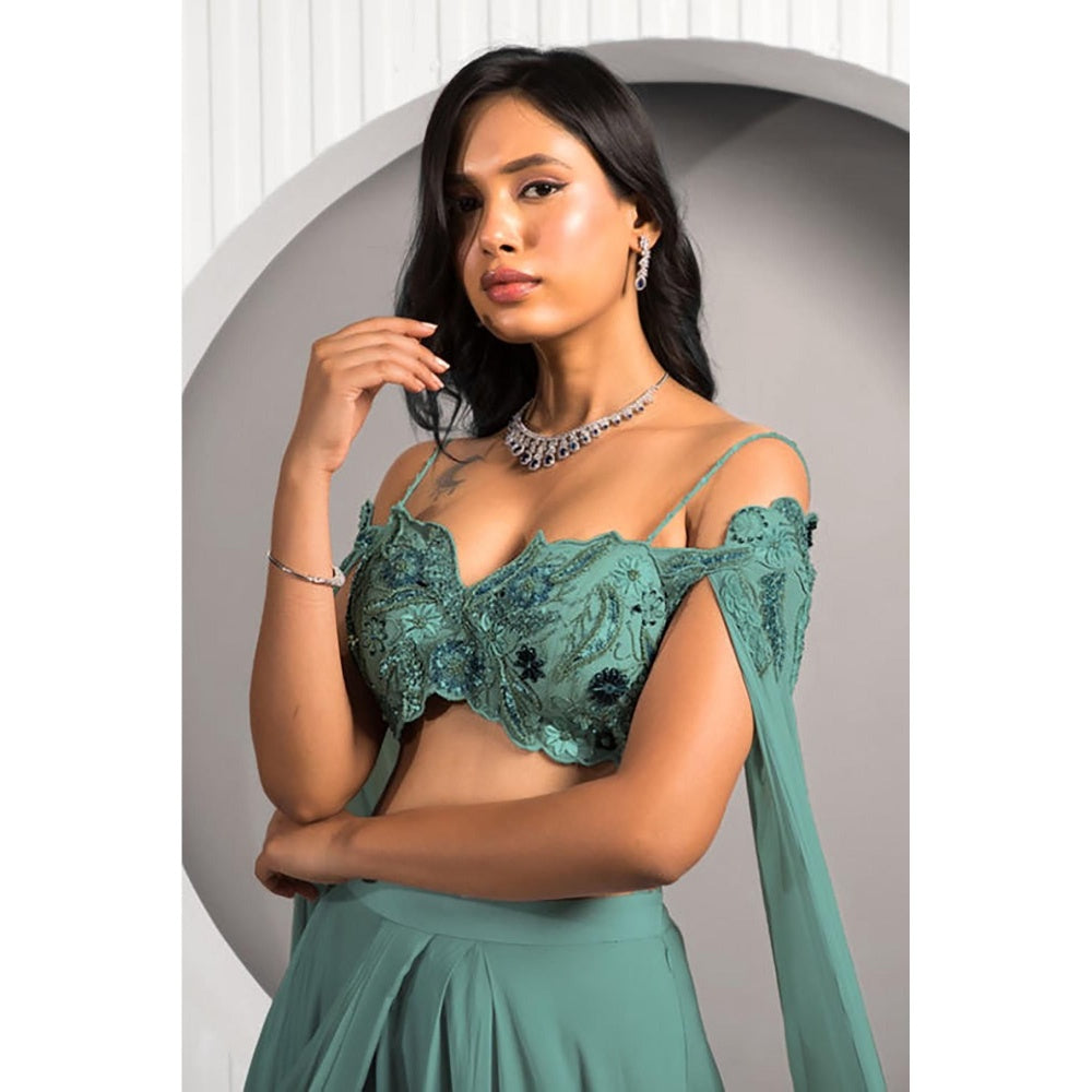 "Two Sisters" by Gyans Teal Georgette Embroidered Sleeveless Lehenga with Cape Blouse