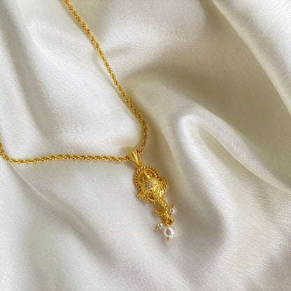 ZARIIN Divine Face Ganesh Pendant Necklace With Pearls And Cubic Zircons