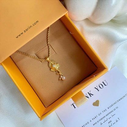 ZARIIN Divine Face Ganesh Pendant Necklace With Pearls And Cubic Zircons