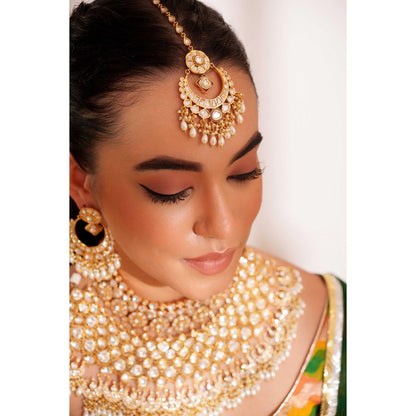 Zevar By Geeta White Udita Kundan Necklace with Pair Of Earrings and Maang Tikka