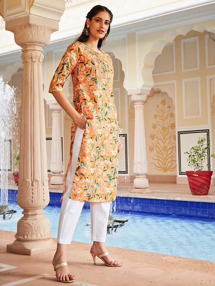 A Orange Floral Digital Print Slub Kurta With Pintuck & Sequence Embellished In Yoke And Lace Detailings Kurta With Off- White Cotton Pants