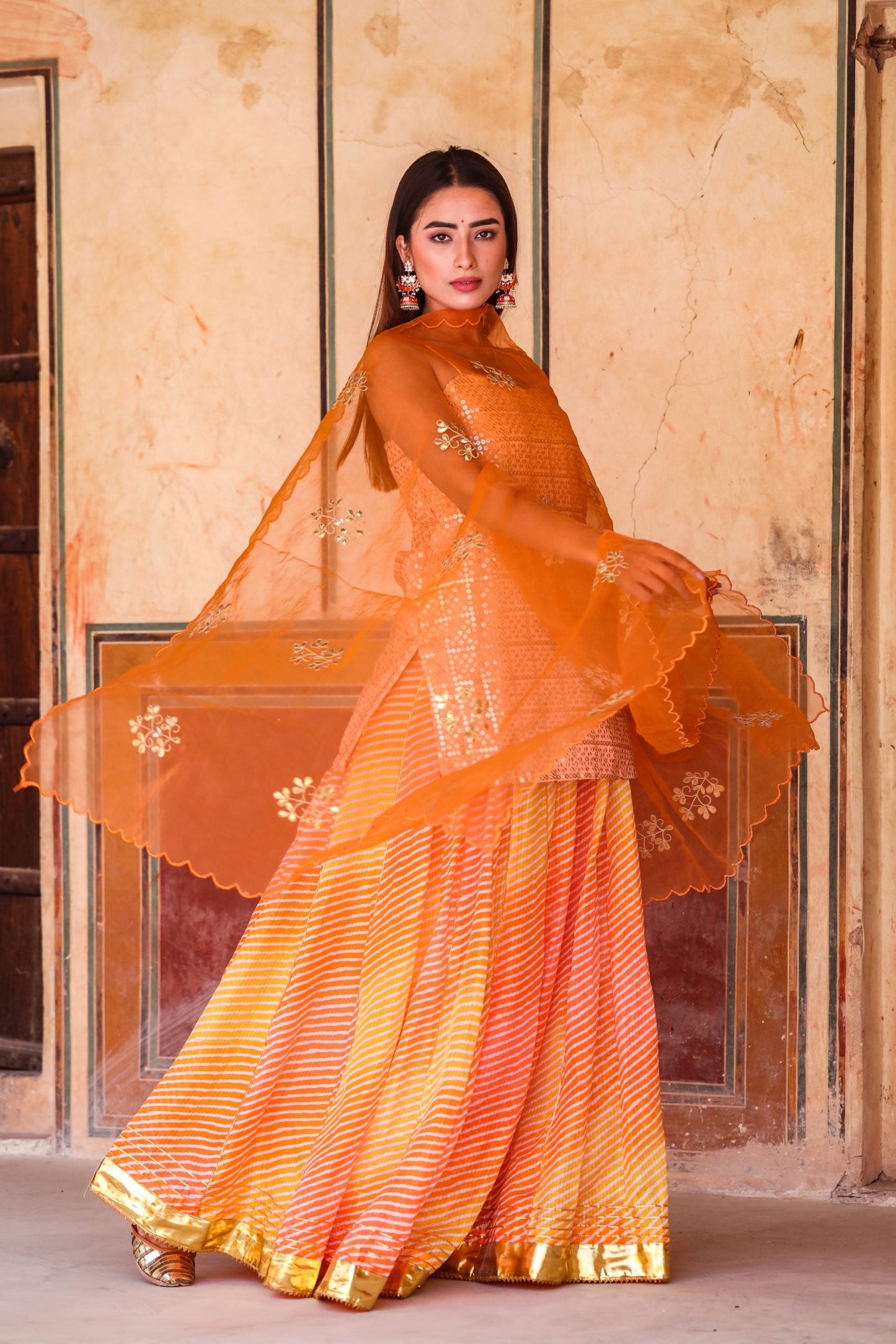 Devaki Orange Lehenga Set