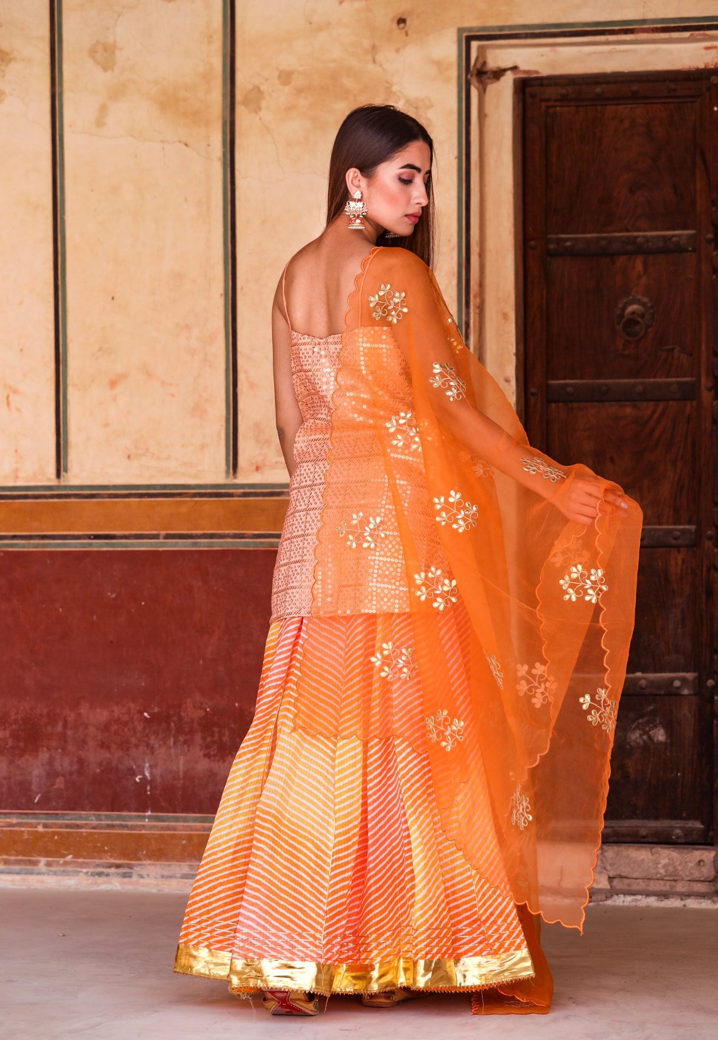Devaki Orange Lehenga Set