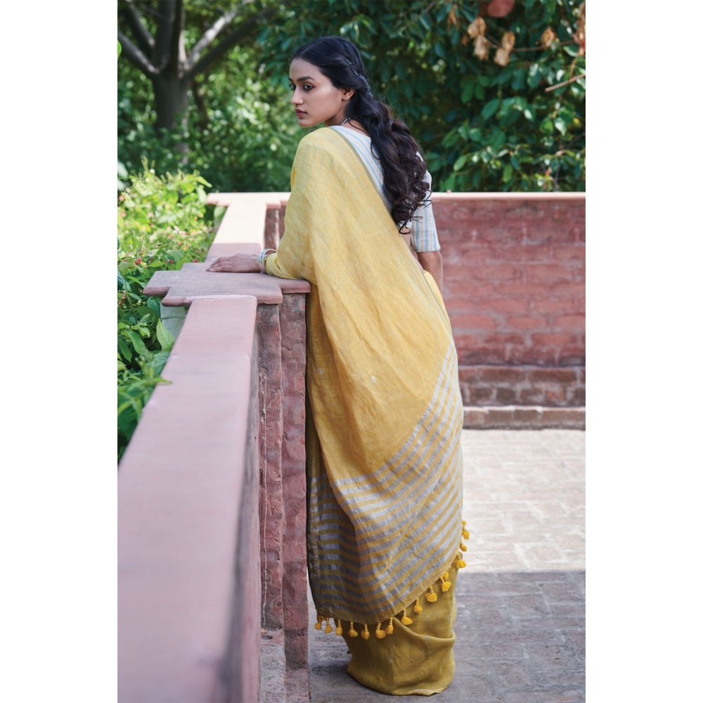 Dressfolk multi toned handwoven yellow saree with detailed jamdani work and silver zari buttas.