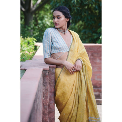 Dressfolk multi toned handwoven yellow saree with detailed jamdani work and silver zari buttas.