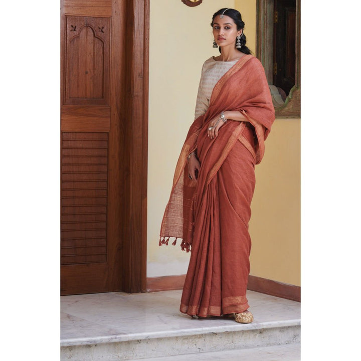 Dressfolk Terracotta handcrafted linen saree.