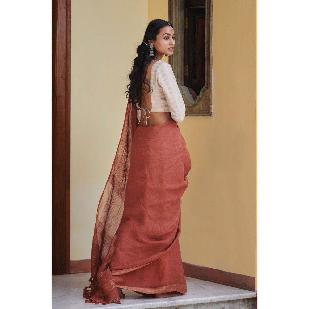 Dressfolk Terracotta handcrafted linen saree.