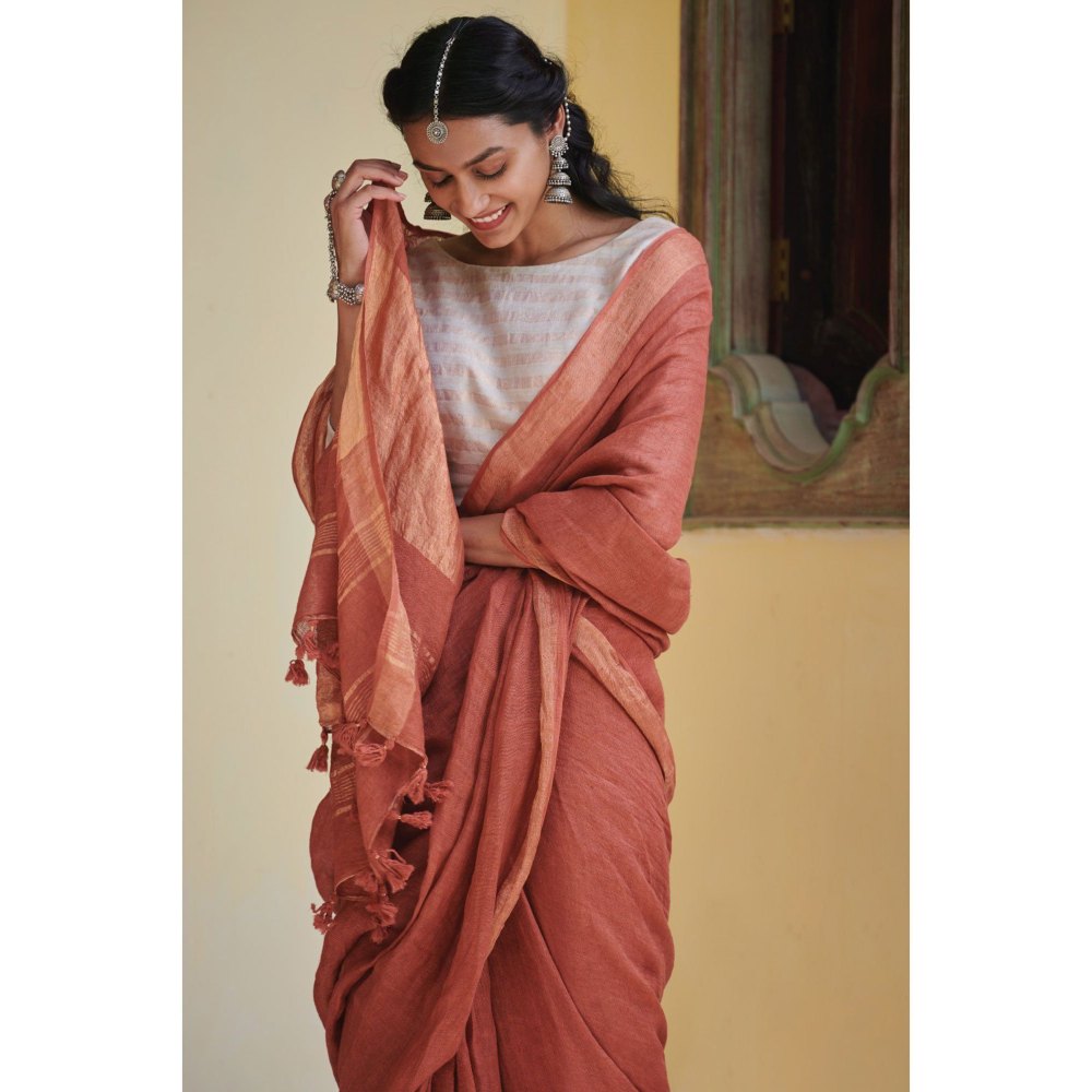 Dressfolk Terracotta handcrafted linen saree.