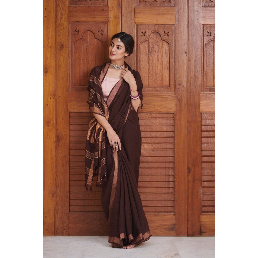 Dressfolk Deep maroon linen handwoven saree with gorgeous golden zari.