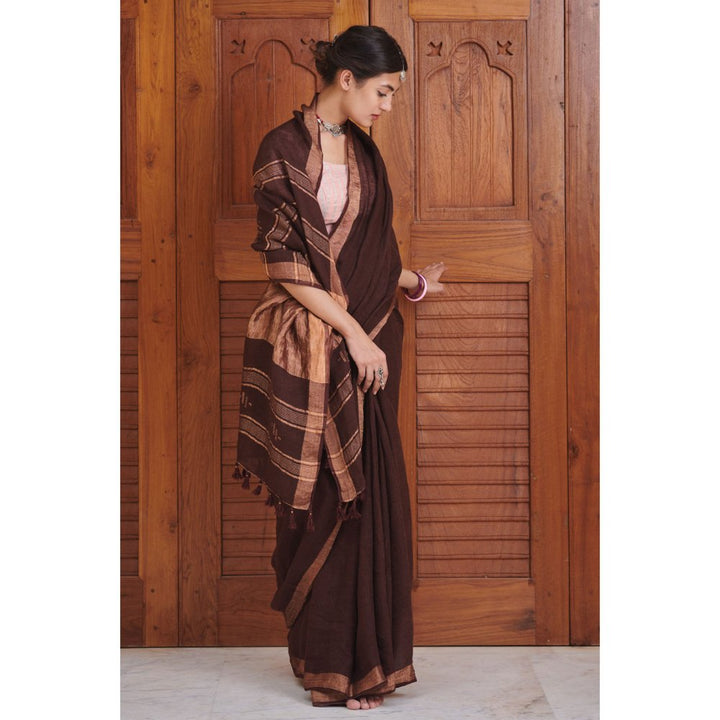 Dressfolk Deep maroon linen handwoven saree with gorgeous golden zari.