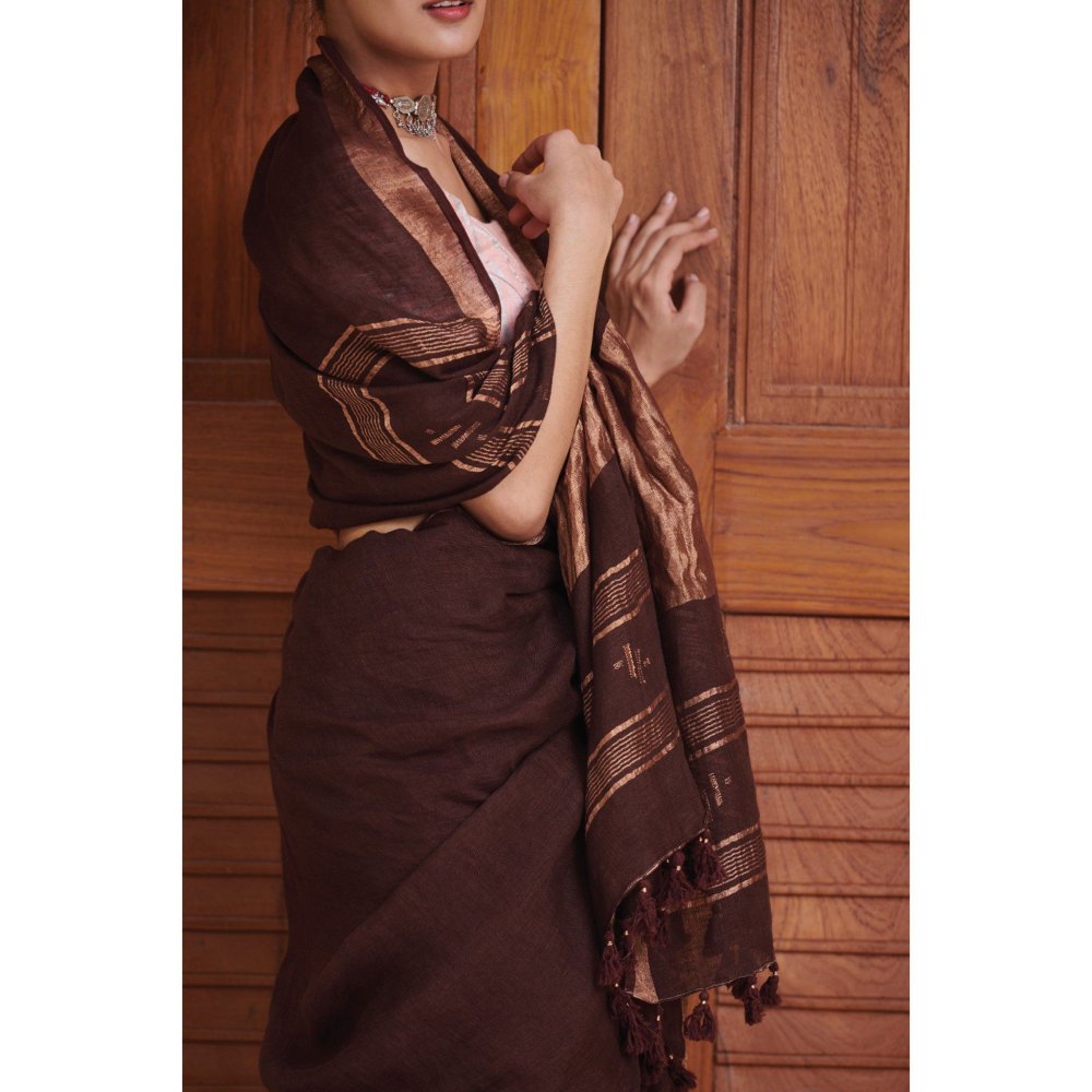 Dressfolk Deep maroon linen handwoven saree with gorgeous golden zari.