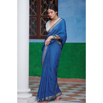 Dressfolk Indigo Saree: Tradition meets style with gold zari and self-colored tassels.