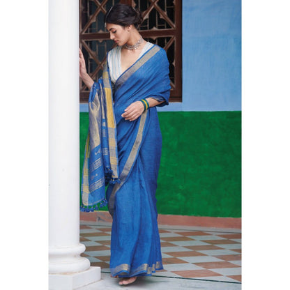 Dressfolk Indigo Saree: Tradition meets style with gold zari and self-colored tassels.