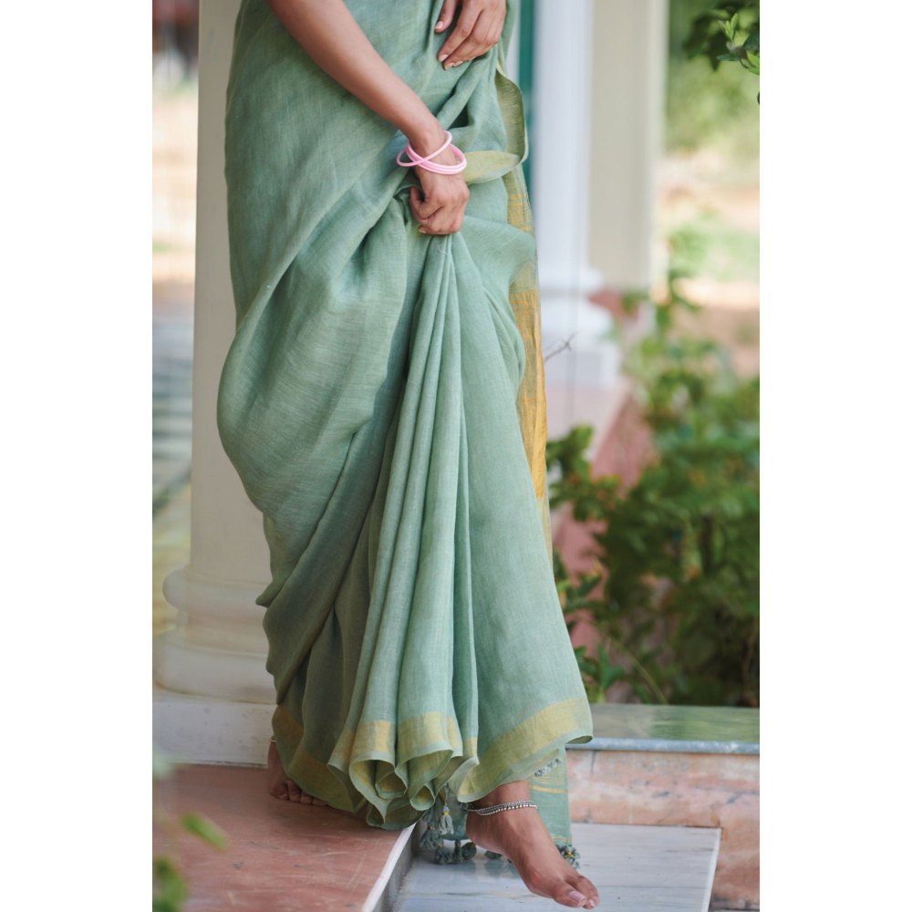 Dressfolk sage green linen jamdani saree