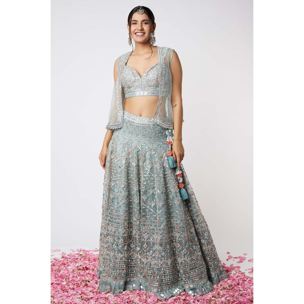 Stone colour short jacket with mint lehenga by Payal Singhal