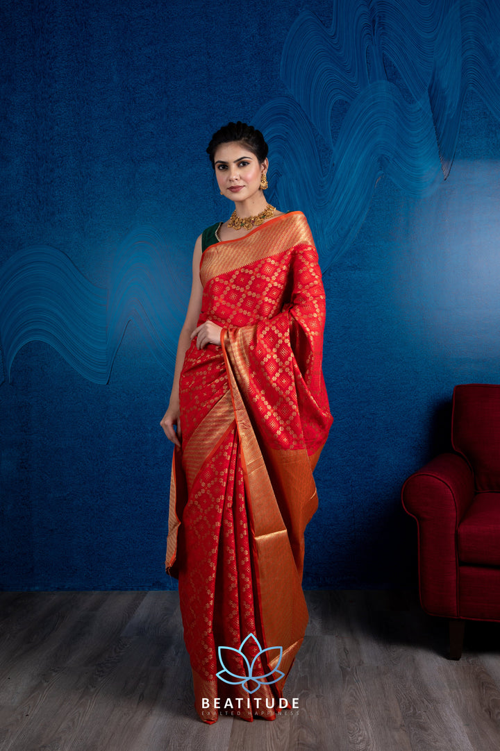 Beatitude Red Gold-Toned Zari Silk Blend Patola Saree with Unstitched Blouse
