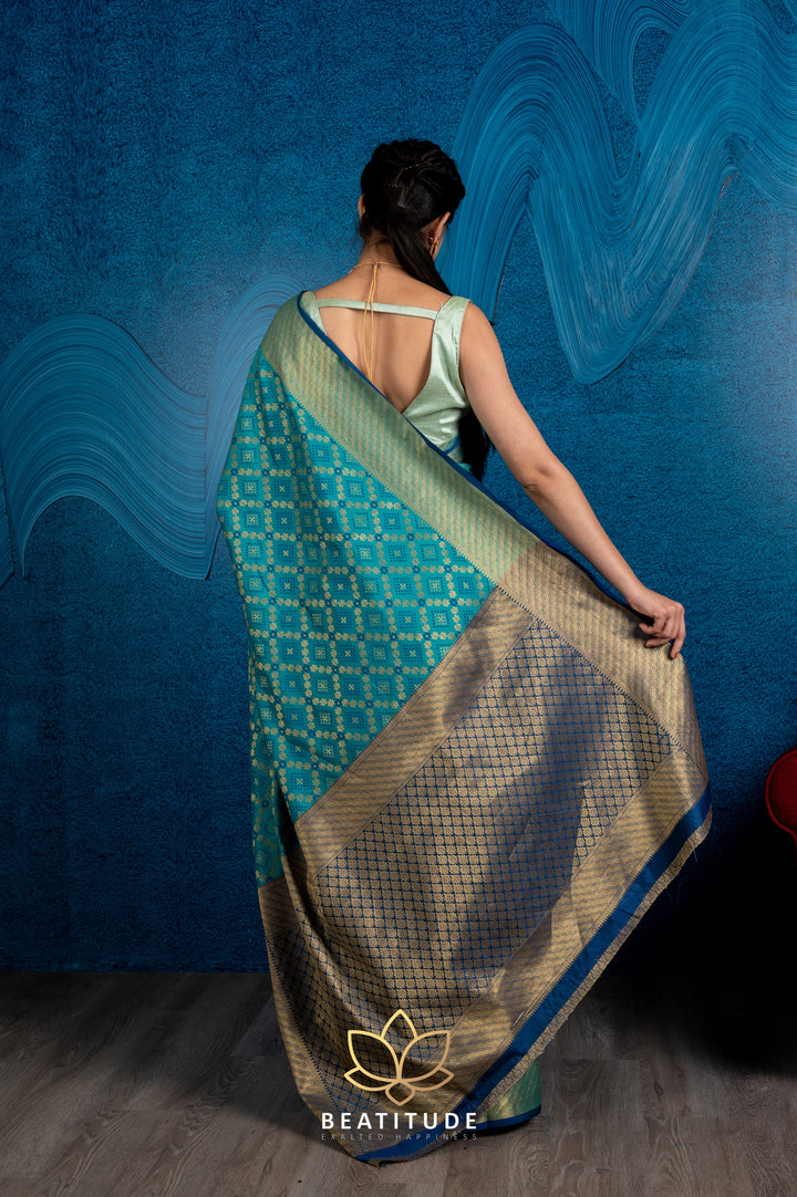 Beatitude Blue Gold-Toned Zari Silk Blend Patola Saree with Unstitched Blouse