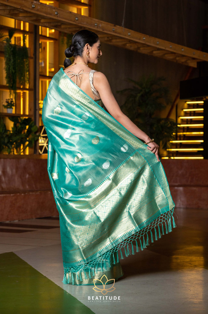 Beatitude Sea Green Gold-Toned Ethnic Motifs Organza Saree with Unstitched Blouse