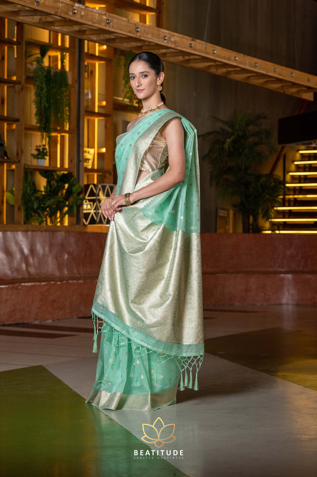 Beatitude Sea Green Gold-Toned Woven Design Zari Saree with Unstitched Blouse