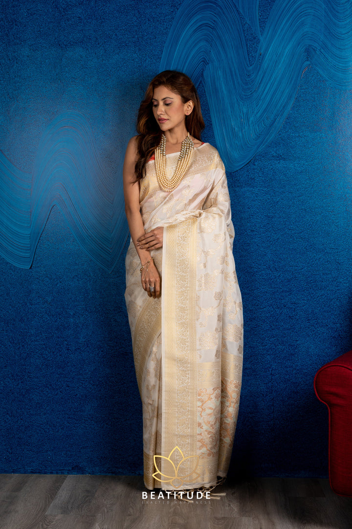 Beatitude Off White Gold-Toned Ethnic Motifs Zari Silk Blend Banarasi Saree with Unstitched Blouse