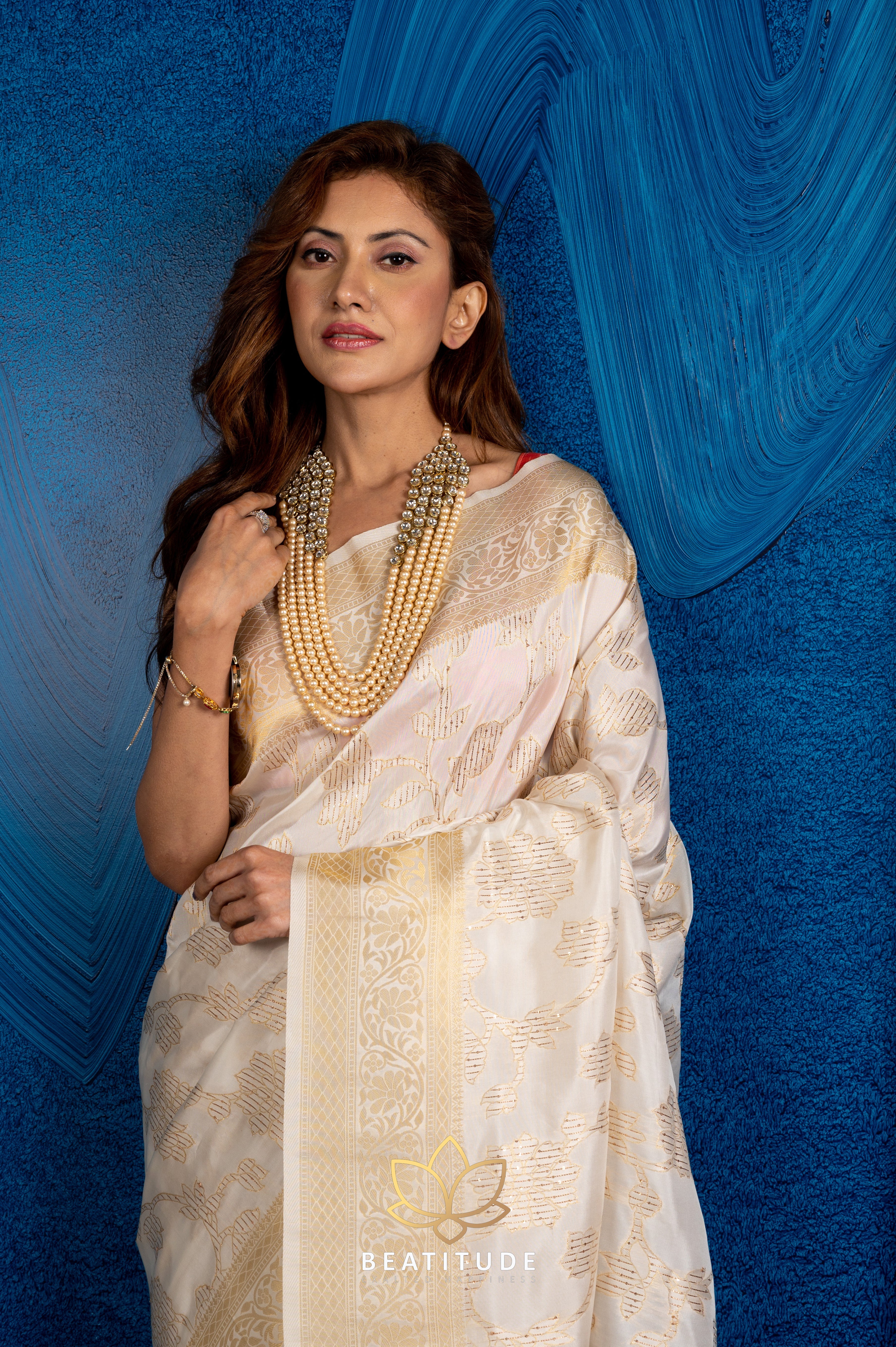 Gold-Toned popular Ethnic Motifs Zari Saree