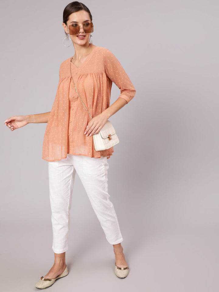 Peach Chiffon Dobby Gathered Top With Flared Hemline	Shop Casual Wear Simple Peach Chiffon Dobby Gathered Top for Women & Girls Online. Buy Kurti, Suits, Tops & Dresses at Jaipur Kurti Website at Best Price  