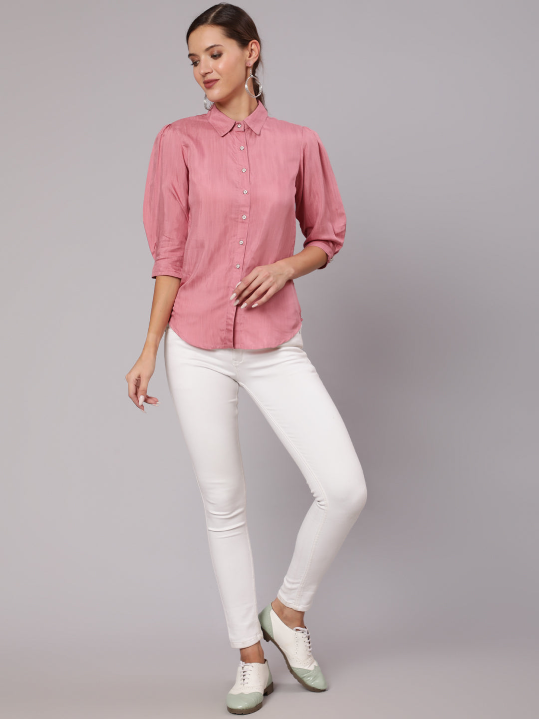 Pink Color Solid Silk Blend Shirt With Front Opening, Has Three-Fourth Puffed Sleeves, Buttons For Closure And A Curved Hem.