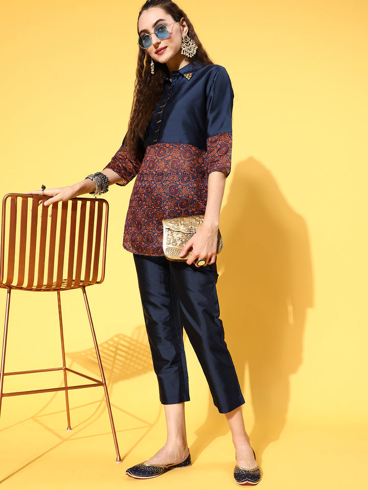 A Teal Color Silk And Shifili Embellished Shirt Paired With Solid Silk Trousers