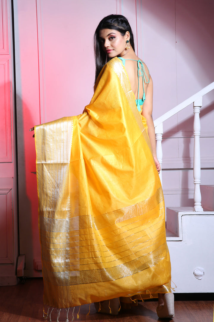 CHARUKRITI Yellow Blended Silk Saree with Temple Border and Unstitched Blouse