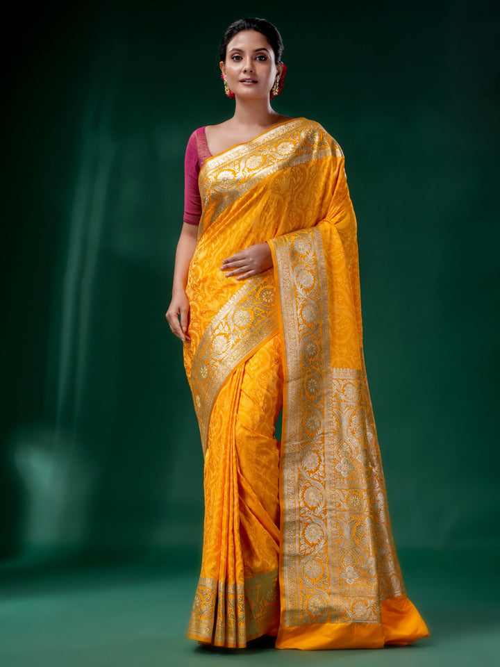 CHARUKRITI Yellow Embross Katan Banarasi Handwoven Saree  with Unstitched Blouse