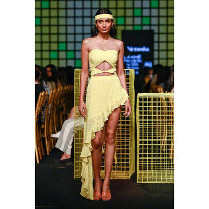 Nirmooha Lemon Yellow Cutout Asymmetrical Dress with attached Hand Embroidered Tassels