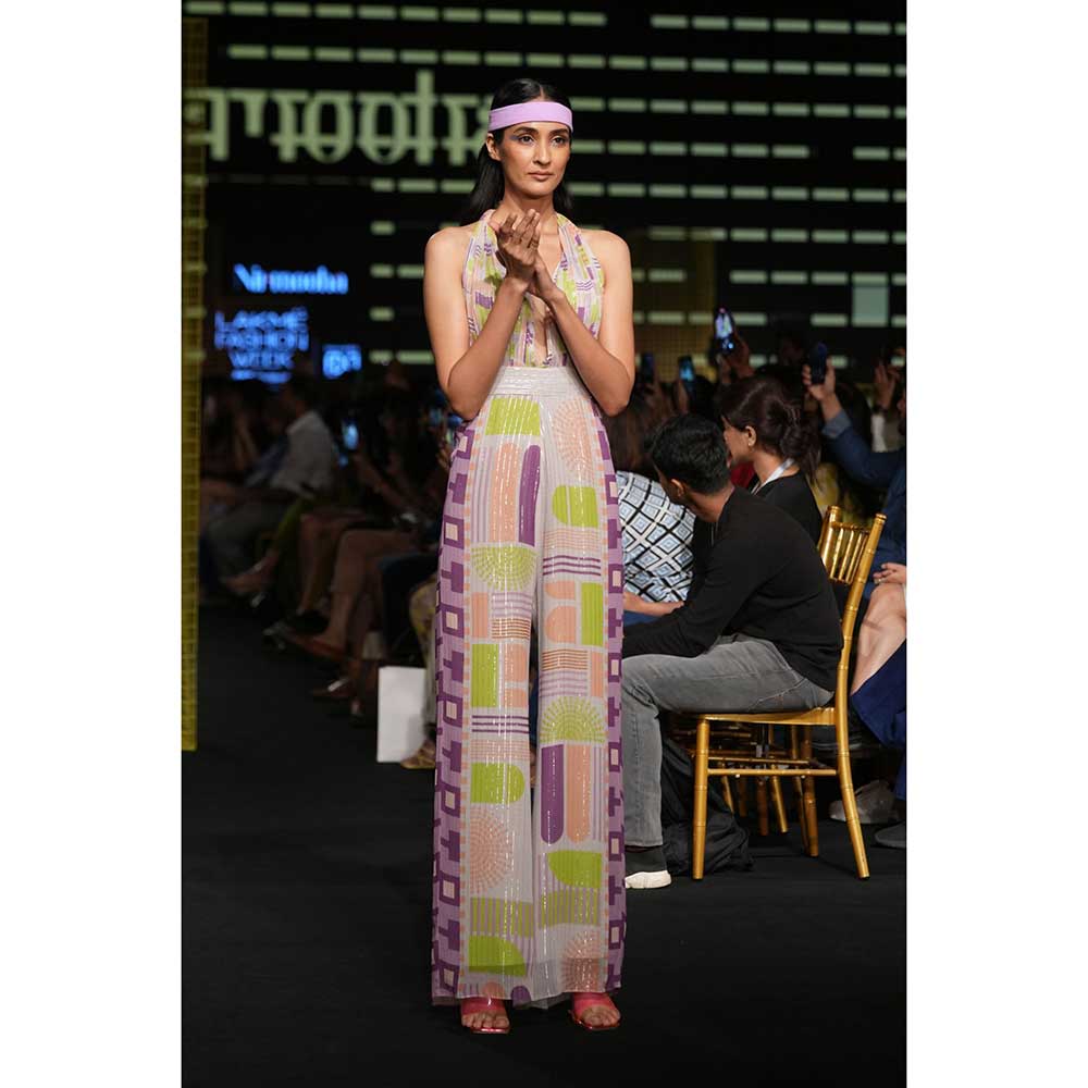 Nirmooha Geometric Printed Deep Halter Neck Tie up Jumpsuit