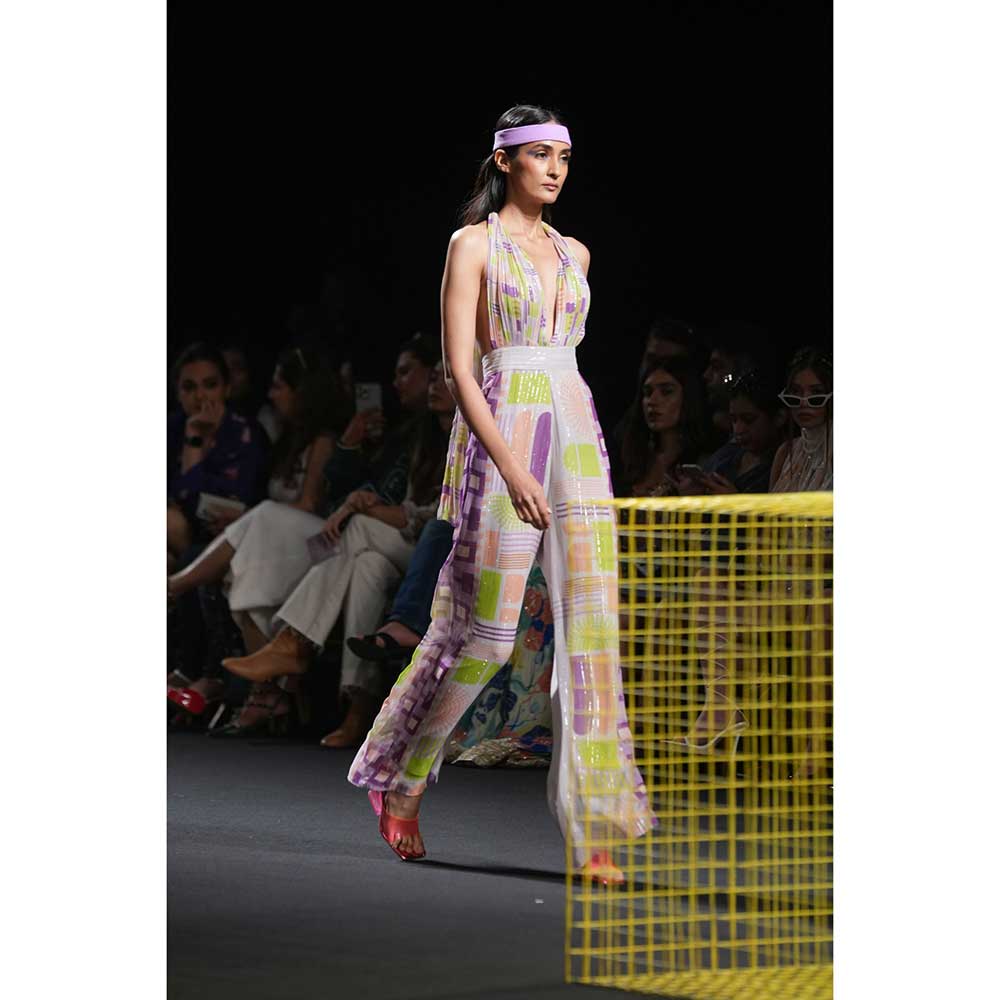 Nirmooha Geometric Printed Deep Halter Neck Tie up Jumpsuit