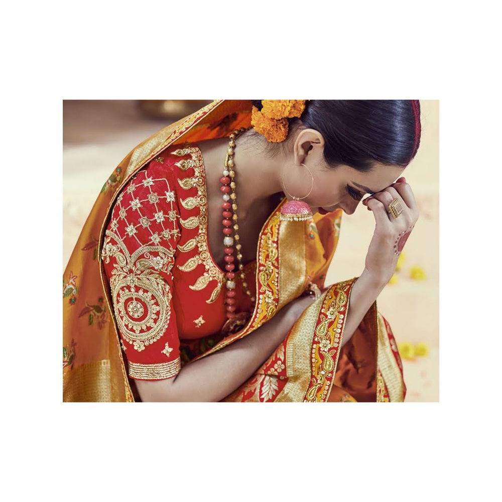 Monjolika Fashion Amber Colored Embroidered Kanjipuram Silk Saree With Un-stitched Blouse