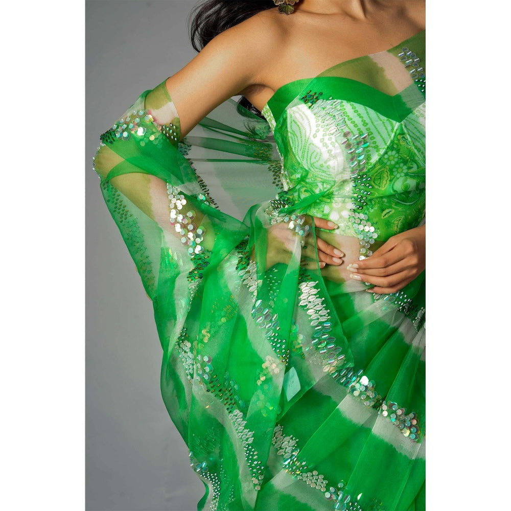 Saksham & Neharicka Green Silk Saree with Embroidery and Unstitched Blouse with Unstitched