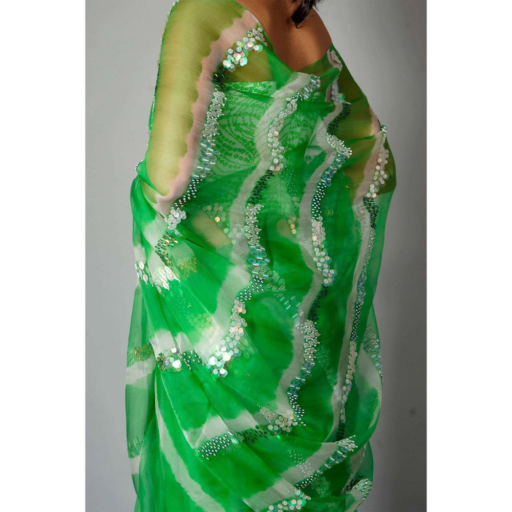 Saksham & Neharicka Green Silk Saree with Embroidery and Unstitched Blouse with Unstitched