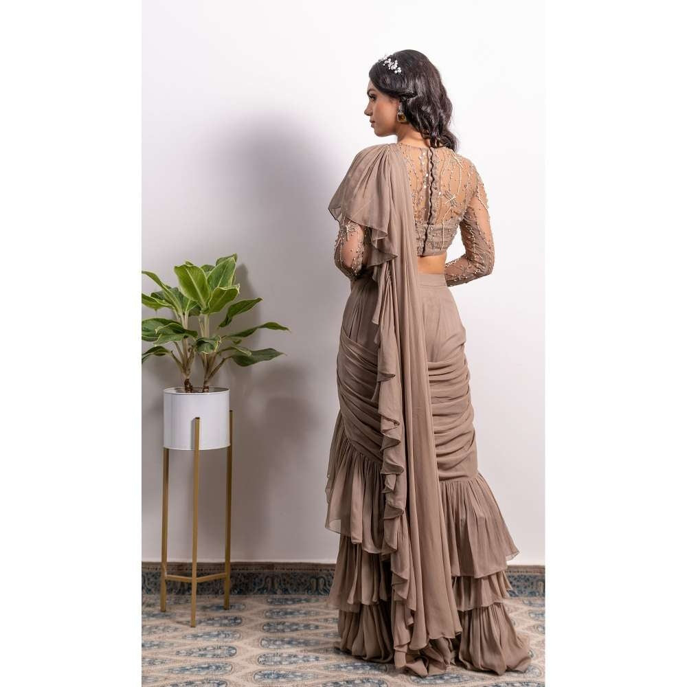 Silky Bindra Frill Saree With Pearl Strap Stitched Blouse