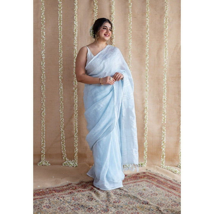 The Indian Ethnic Co. Blue Linen Silver Zari Border Saree & Unstitched Blouse with Mukaish Detailing