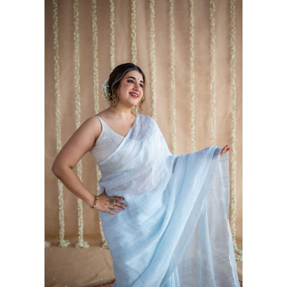 The Indian Ethnic Co. Blue Linen Silver Zari Border Saree & Unstitched Blouse with Mukaish Detailing