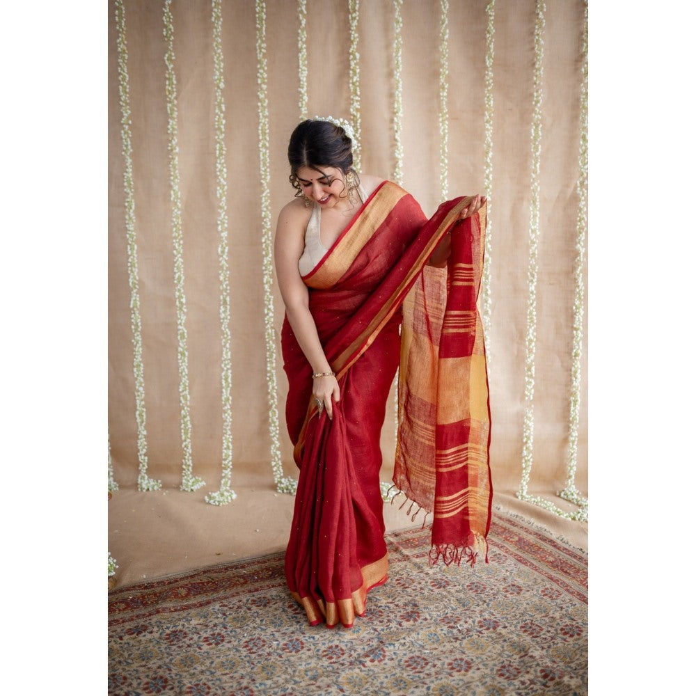 The Indian Ethnic Co. Maroon Golden Zari Border Saree & Unstitched with Mukaish Detailing