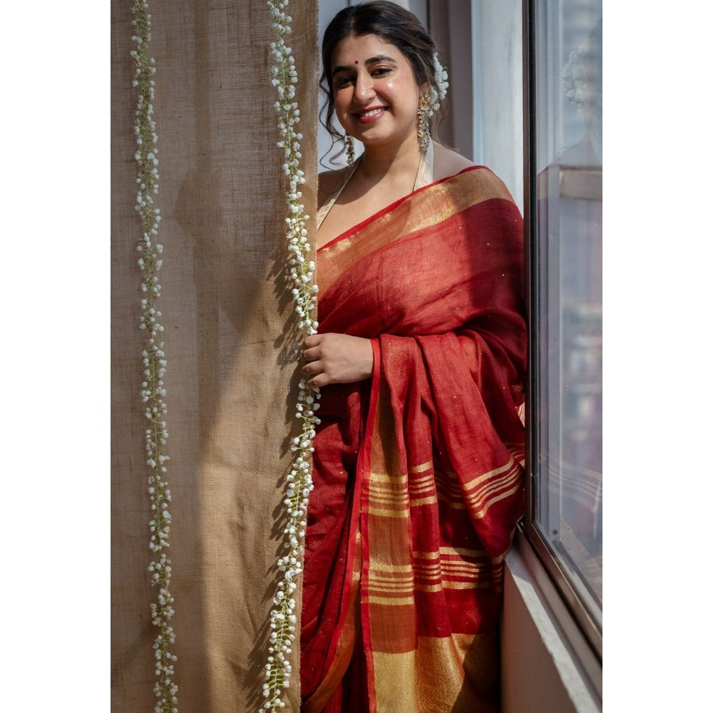 The Indian Ethnic Co. Maroon Golden Zari Border Saree & Unstitched with Mukaish Detailing