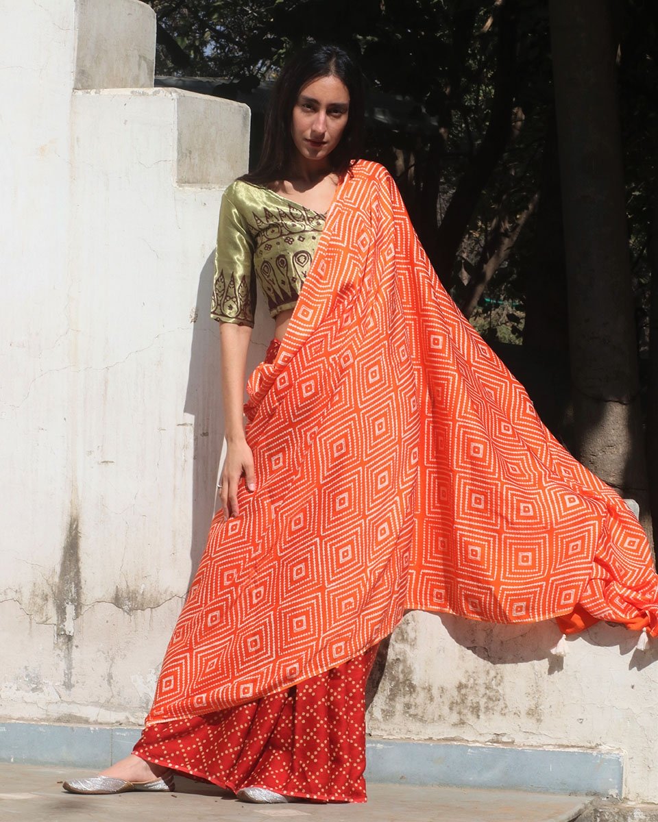 Chidiyaa Orange Modal Silk Saree with Unstitched Blouse
